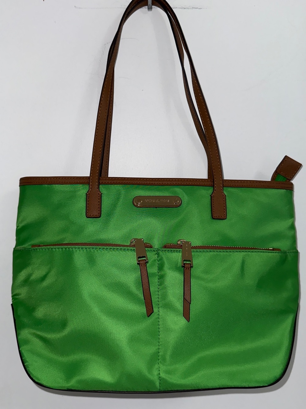 Michael Kors Green KemptonTote with Brown Trim and Gold Hardware Medium pocket.